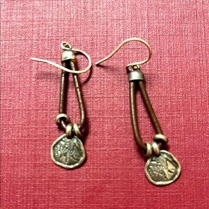 Silpada earrings. Marked 925 Israel. brown leather cord